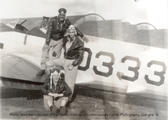 SS27_three pilots in leather jackets, flight caps and aviator goggles